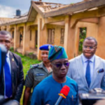 DEFENCE MINISTER VISITS JOS ATTACK SITE, PLEDGES TO END VIOLENCE